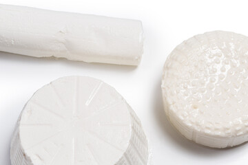 fresh white cheeses on a white background