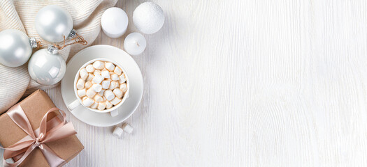 Christmas background with coffee with marshmallows, candles and Christmas decorations. Merry Christmas, New Year. Top view, copy space