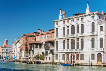 Fototapeta na wymiar Facades of centennial buildings on the banks of the Grand Canal in Venice. Italy, 2019