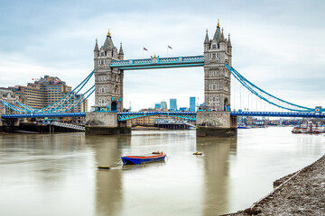 Fototapeta na wymiar A long exposure view of the Tower Bridge, a world-famous symbol of London