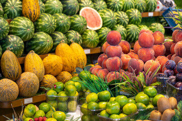 Fruit and vegetable market counter. Fresh a variety of fruits lie on the counter in the store.