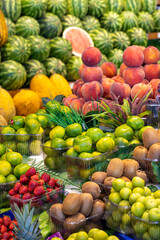 Fruit and vegetable market counter. Fresh a variety of fruits lie on the counter in the store.