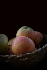 Apples in a basket. Organic apples. Imperfect apples. Ripe fruit