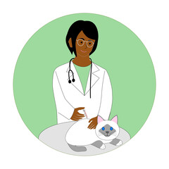 Black female veterinarian inject a Birman cat with white background