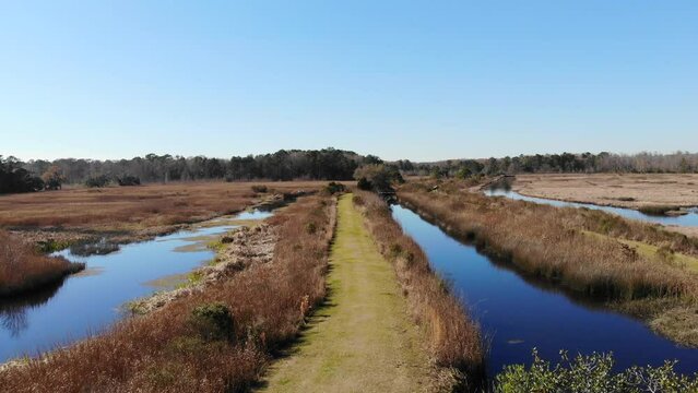 aerial footage of the waterways at Caw Caw Interpretive Center Park in Ravenel, South Carolina