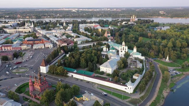 Picturesque summer view of russian town of Yaroslavl with many churches and Kotorosl river at sunset