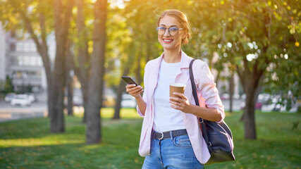 Businesswoman standing summer park Business person