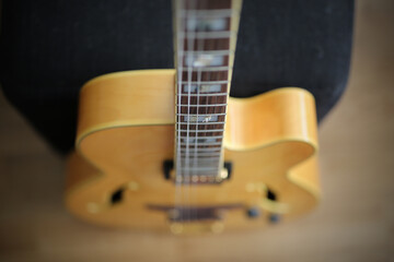 Detail of a semi-acoustic jazz guitar.