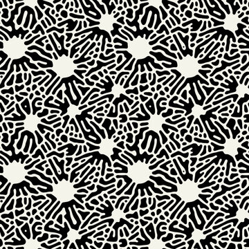 Vector seamless pattern. Free form organic shapes. Stylish structure of natural spots. Hand drawn abstract background. Can be used as swatch in Illustrator. Monochrome spotty print.