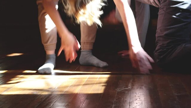 Dancer improvising an intimate dance on the floor. contact with the dancer, on the floor, dance performance, improvisation