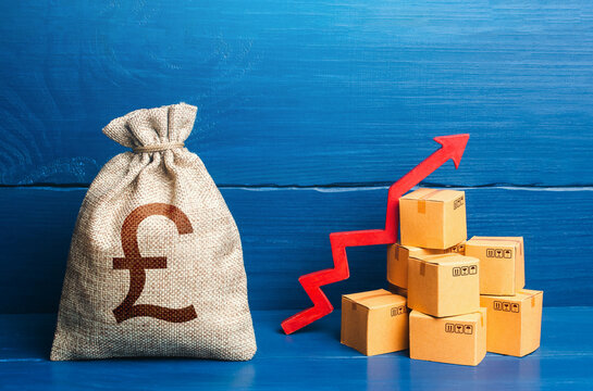 British pound sterling money bag with boxes and up arrow. Income increase, acceleration and growing of economy. Production rise. Growing prices. Good consumer sentiment and demand for goods.