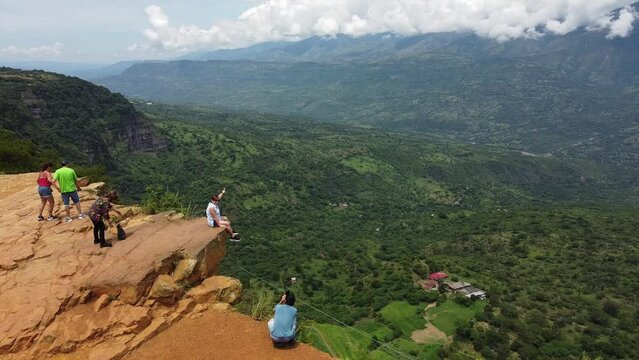 Colombia August 2022 Drone aerial view of Mirador Salto del Mico, overhanging rock in the Colobian Andes in Barichara  a town in northern Colombia South America  - tourist visiting natural sightseeing