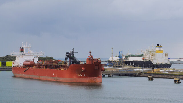 Shuttle tanker and LNG carrier in the European port