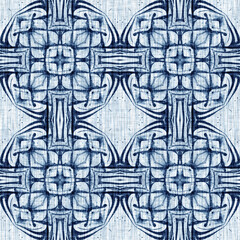 Obraz premium Indigo Dye Wash Coastal Damask Quilt Seamless Pattern. Washed out Geometric Dip Dyed Blur effect for Nautical and Marine Ocean Blue Interior Textile Backgrounds with Linen Texture Tile