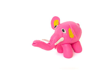 Cute elephant plasticine sculpture, pink body on white background. Handmade clay plasticine
