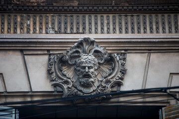 coat of arms on the facade of a building