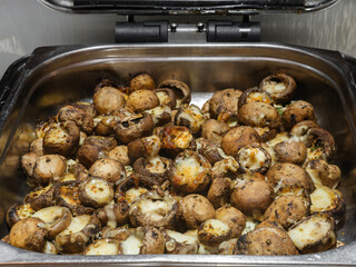 mushrooms with cheese cooked in a pot