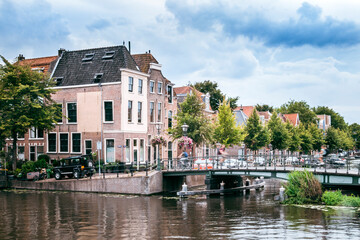 Fototapeta na wymiar Panorama of Leiden. Famous canals and bridges on a summer afternoon.