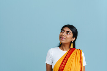 Portrait of young beautiful indian woman in traditional dress