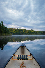 Wild photography alone on a lake in Canada, perfect reflection, nature picture