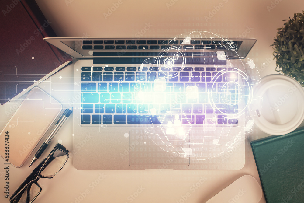 Poster social network hologram drawings over computer on the desktop background. top view. double exposure.