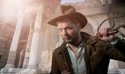 Young sexy unshaven man in cowboy hat. Romantic image of a vintage 

traveler and adventurer. like...