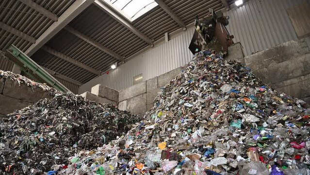 Large Pile of Waste Inside Trash Sorting Facility