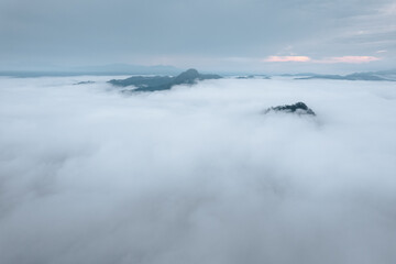 Fototapeta na wymiar fog and mountains in the morning