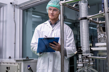 maintenance engineer scientist routine check the distillation glass siphon tube