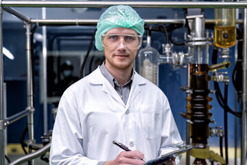 maintenance engineer scientist routine check the distillation glass siphon tube