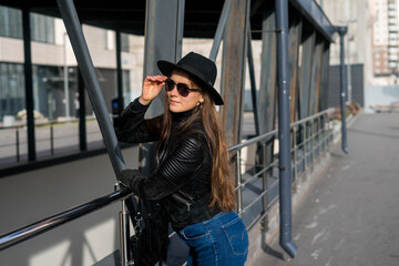 Fototapeta premium Woman Going To Work With Coffee Walking Near Office Building