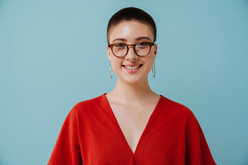 Young woman wearing eyeglasses smiling and looking at camera