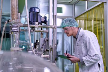 maintenance engineer scientist routine check the distillation glass siphon tube