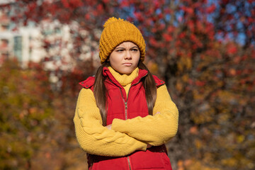 unhappy teen girl at school time outdoor in autumn season