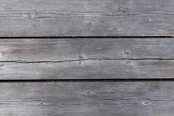 Fototapeta na wymiar grey wooden wall of grey horizontal slats