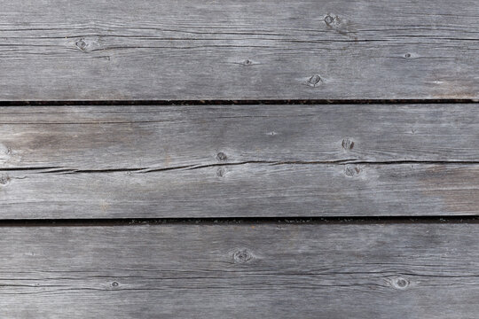 grey wooden wall of grey horizontal slats