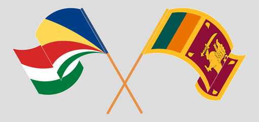 Crossed and waving flags of Seychelles and Sri Lanka