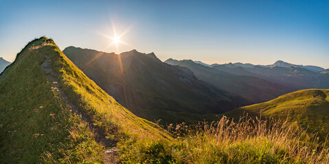 Stunning sunset hike from the top in the austria mountain