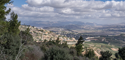 Fototapeta premium View of Southern Labanon villages Marjayoun, Al Qulayah, Al Khiyam, Kafr Kla, Kafr Shuba, Al Ghajr with Metula as seen from Mitzpe Benya lookout, located at the foot of Misgav Am, Upper Galilee,Israel