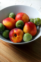 White bowl with fresh fruit