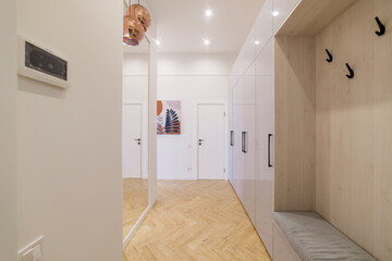 Interior design of the apartment. White walls and bright furniture