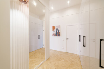 Interior design of the apartment. Bright dwelling and wood flooring