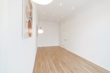 Empty, new bright room in white with wood floor