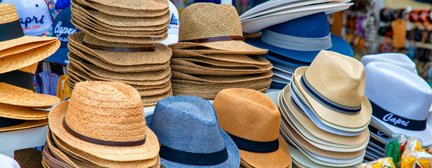Straw hats in a shop of Capri, Italy