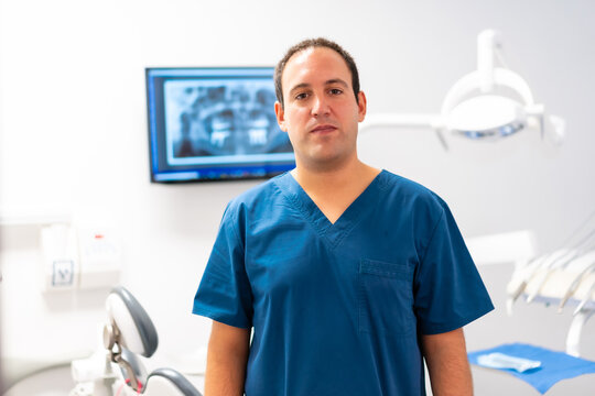 Dental Clinic, Portrait Of A Caucasian Male Dentist At His Workplace. Clinic Owner