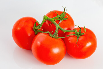 Close up shot of red tomato with water drops