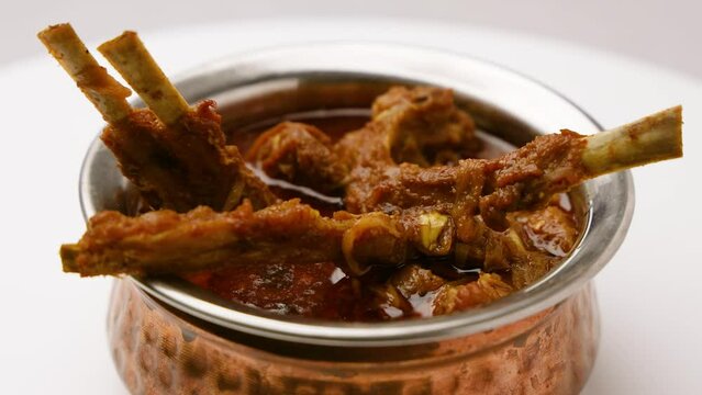 Mutton curry or Mutton gravy is a delicious Indian curried dish of soft tender chunks of meat in spicy onion tomato gravy