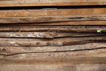 Obraz premium pile of teak tree boards for mable material