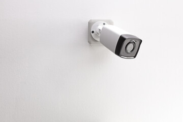 Security camera mounted on a wall