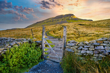 Beautiful coloured skies, sunrise over Penyghent in the Yorkshire Dales